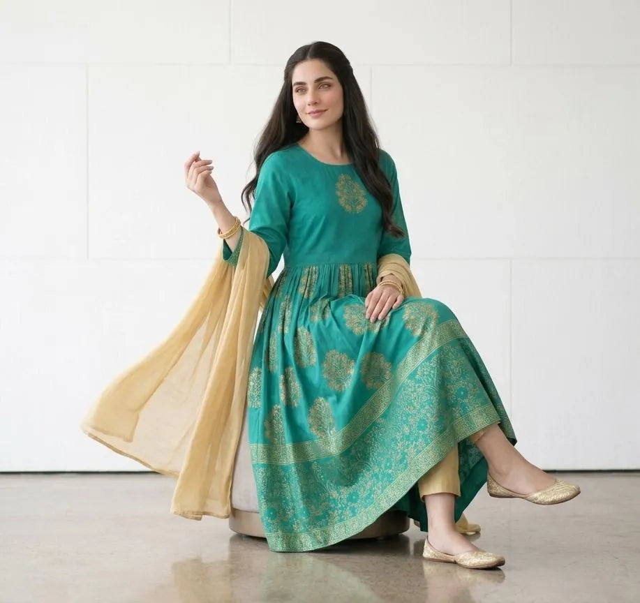 Model wearing Green Arabic Lawn Maxi Set – walking pose with dupatta
