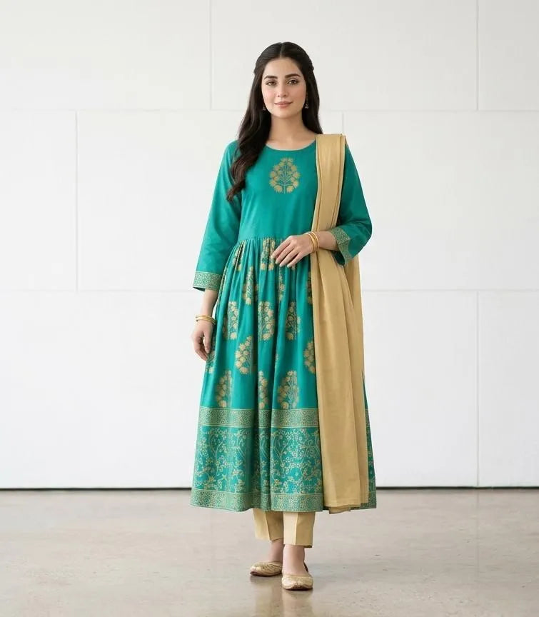 Model wearing Green Arabic Lawn Maxi Set – seated pose